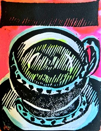 A cup of green tea with a gently smiling mouth reflected in its surface.