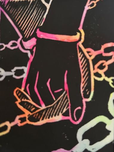 The Devil, a pair of hands clasped together among a network of chains.