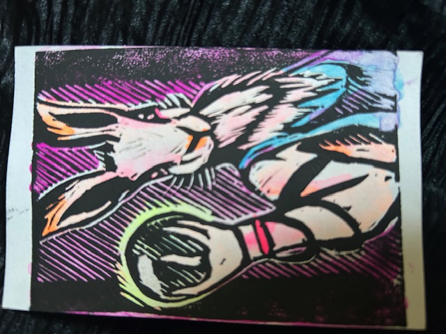 The High Priestess, a rabbit holding a crystal ball.