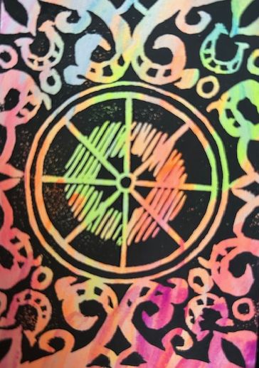 The Wheel, an elaborate wheel surrounded by flame and horseshoe motifs